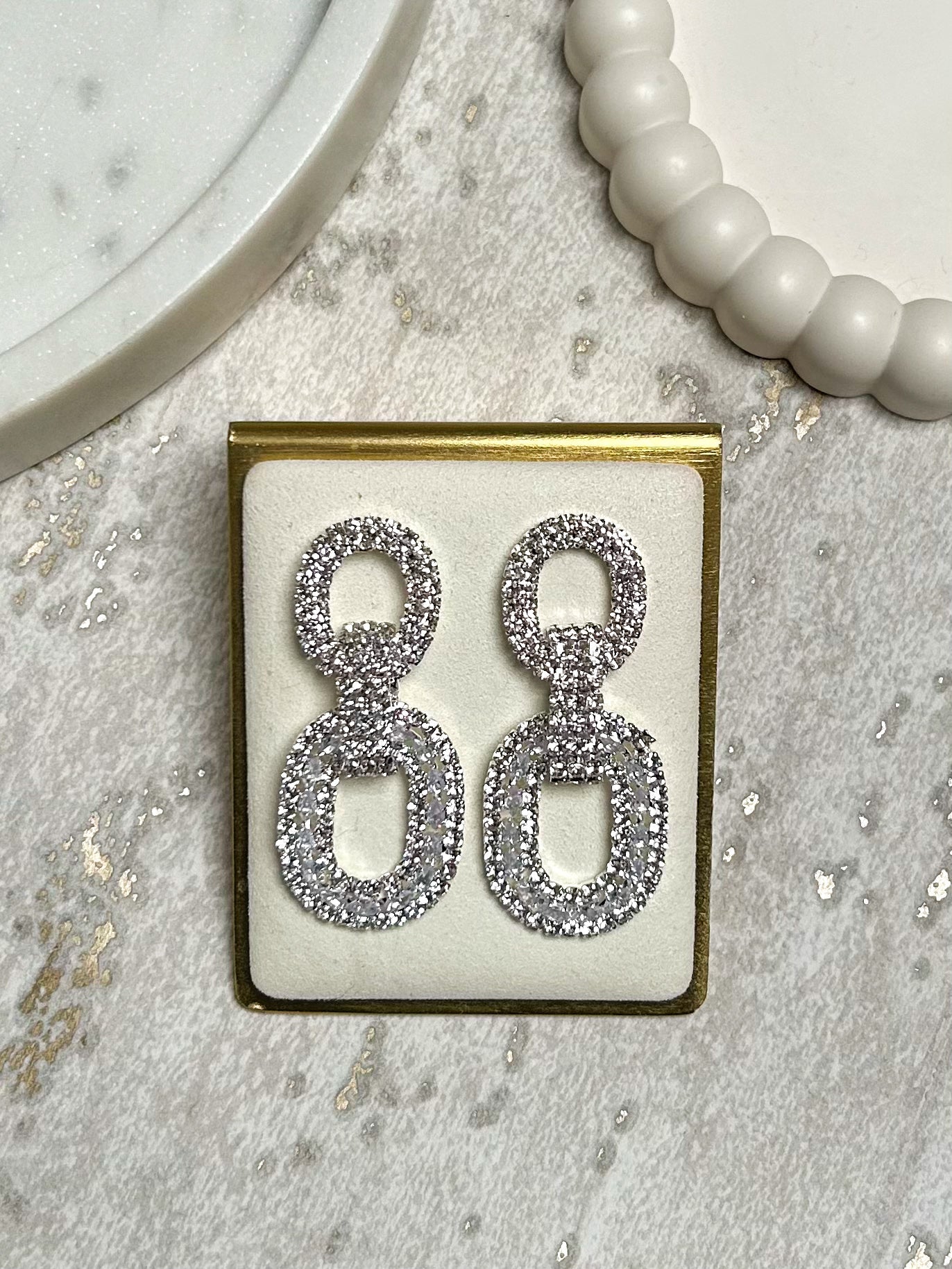 Diamante Oval Intertwined Dangle Earrings