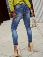 Women's Washed Denim Trousers with Button and Zipper Cut
