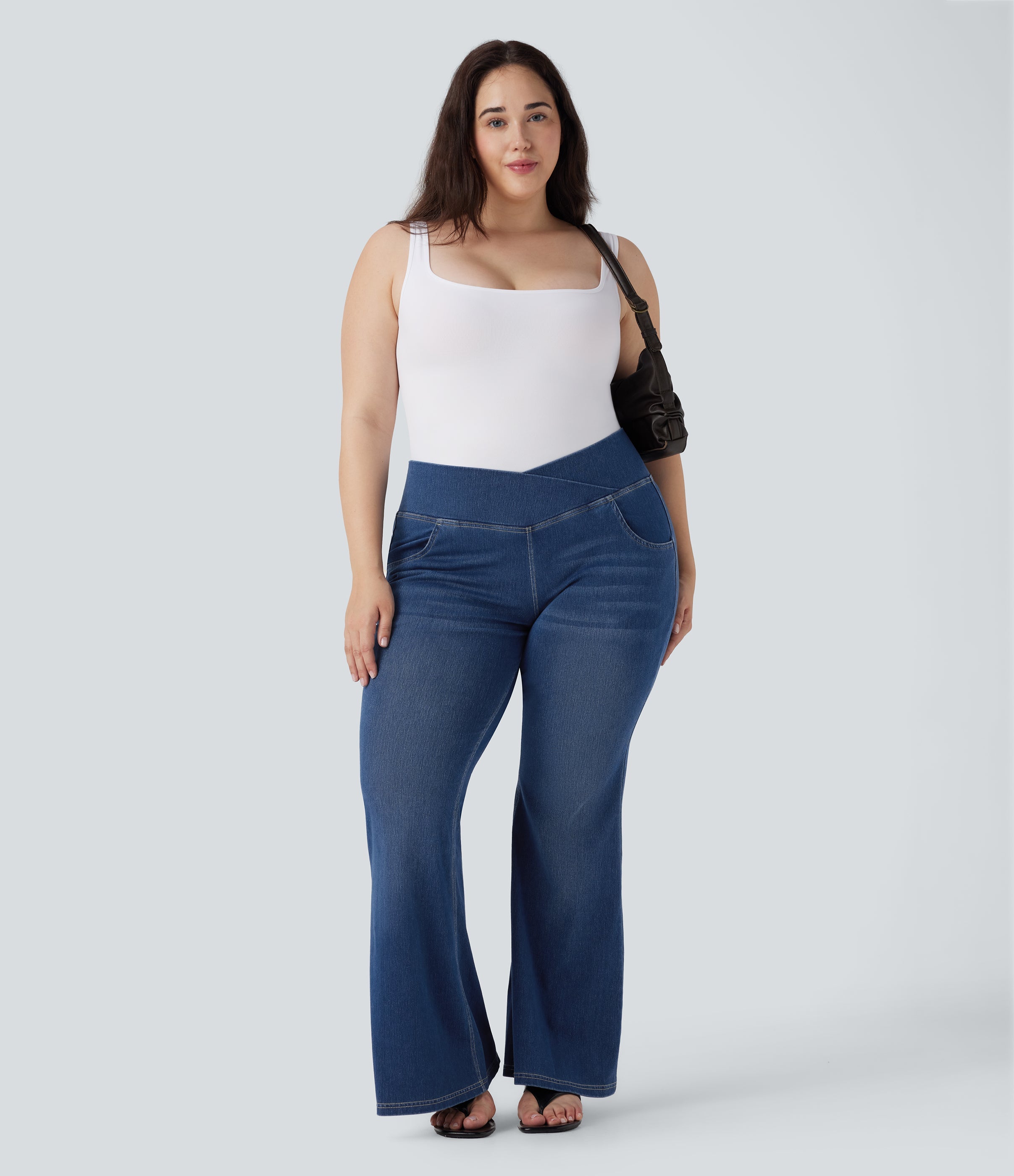 Plus Size FlexTM High Waisted Crossover Washed Casual Flare Jeans with Pockets