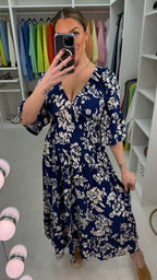 Janella Floral Print V Neck Magic Maxi Dress