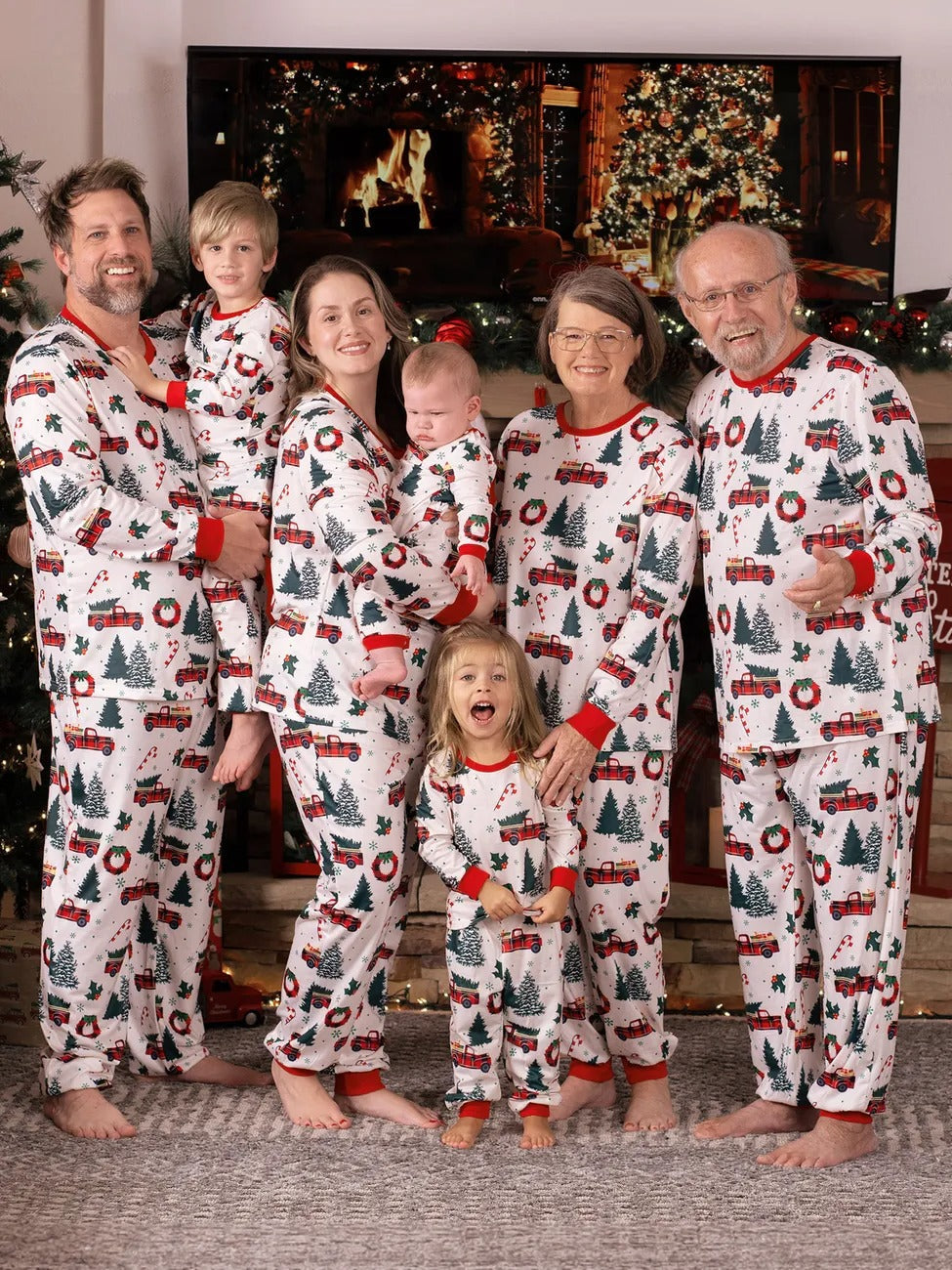 Superb white pajamas with Christmas trees red trucks motifs for all the family
